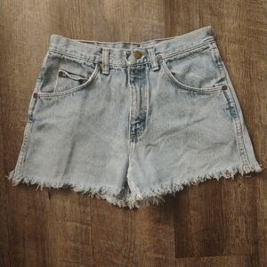 Vintage Wrangler slightly distressed high waisted light wash jeans